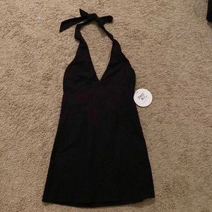 THE CUTEST BLACK DRESS. NEVER WORN!! TAGS STILL ATTACHED